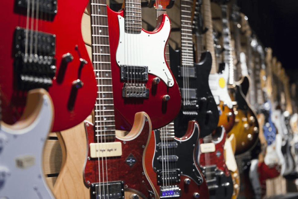 4 Different Types of Guitars & the Legends Who Played Them