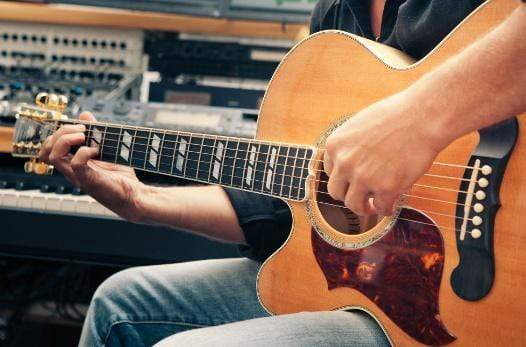 learn to play left-handed guitar
