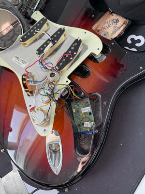 Used Fender 2016 American Professional Strat view of the installed active mid boost and the electronics