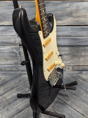 Used Squier bass side view of the body