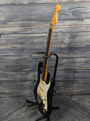 Used Squier full treble side view of the guitar