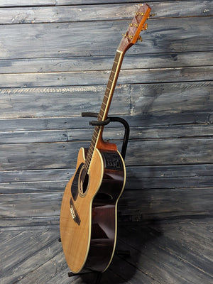 Takamine Left Handed GN51CE full bass side view of the guitar