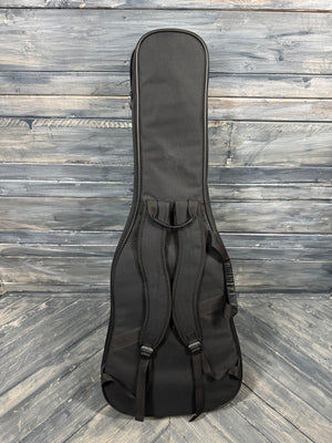 Black guitar case on a wooden floor