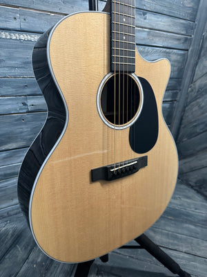 Acoustic guitar on a wooden surface
