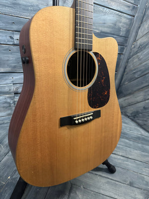 Acoustic guitar on a wooden surface
