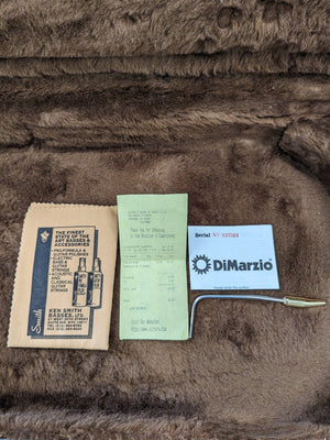 tremolo arm, cleaning cloth and receipt and manual for Dimarzio PAF installed in bridge position