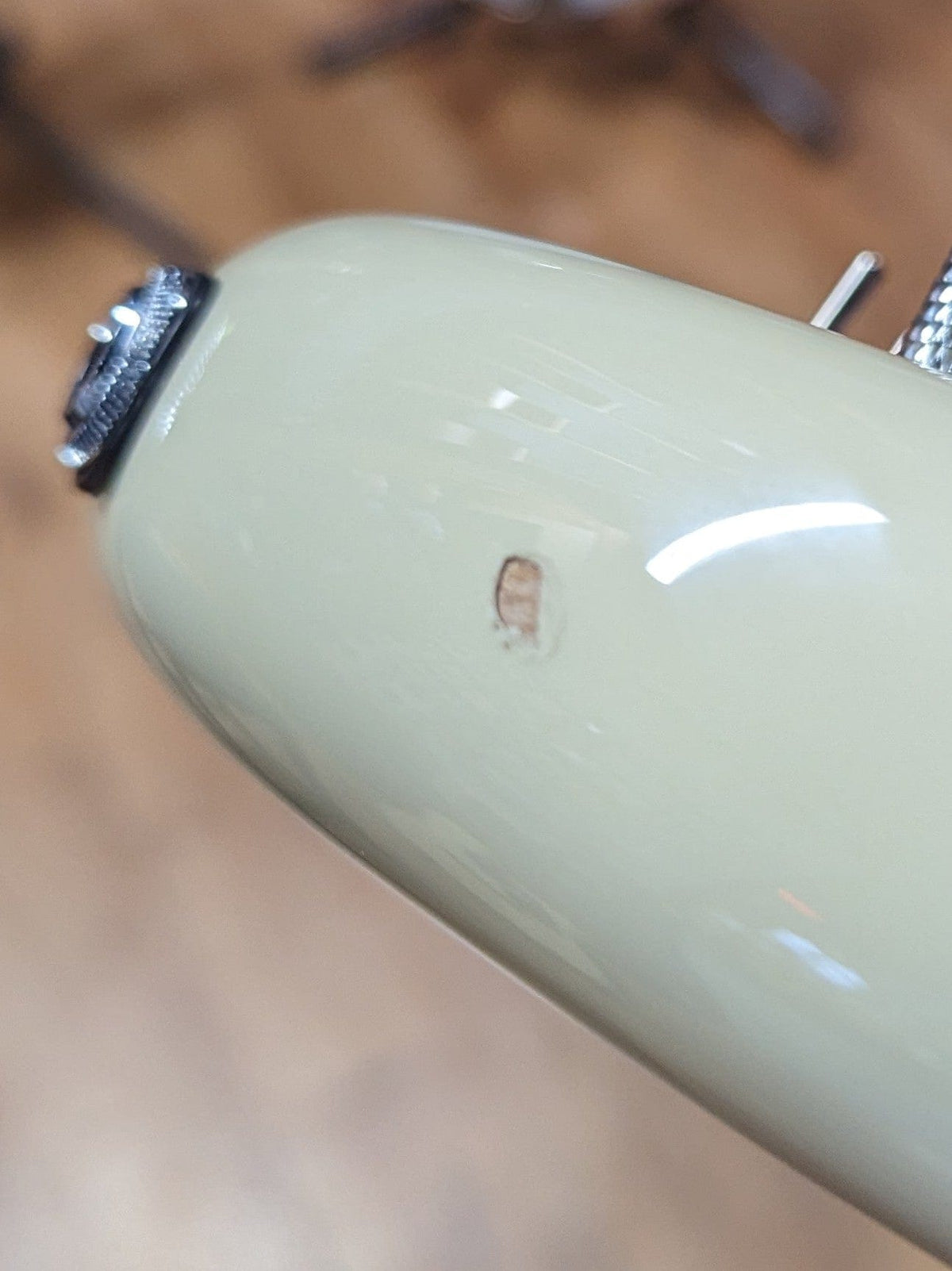 close up of chip in the finish near the input jack