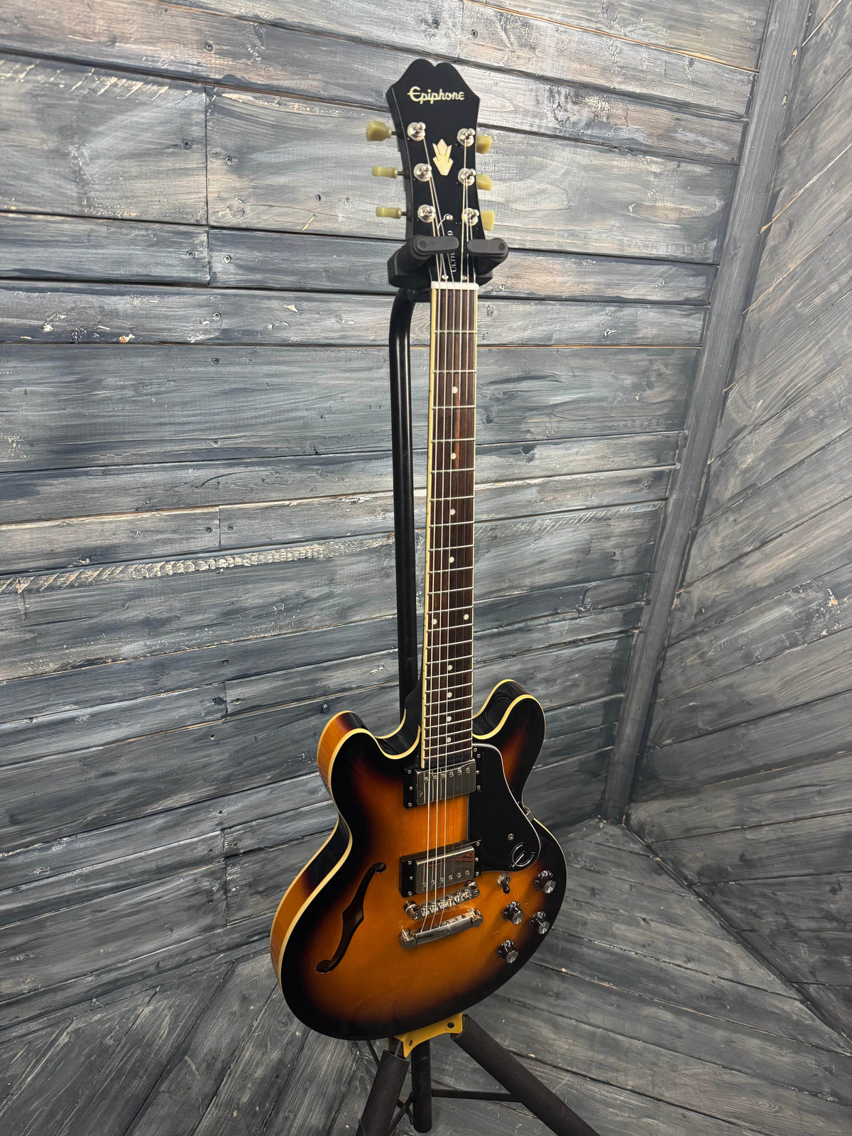 Electric guitar on a wooden floor