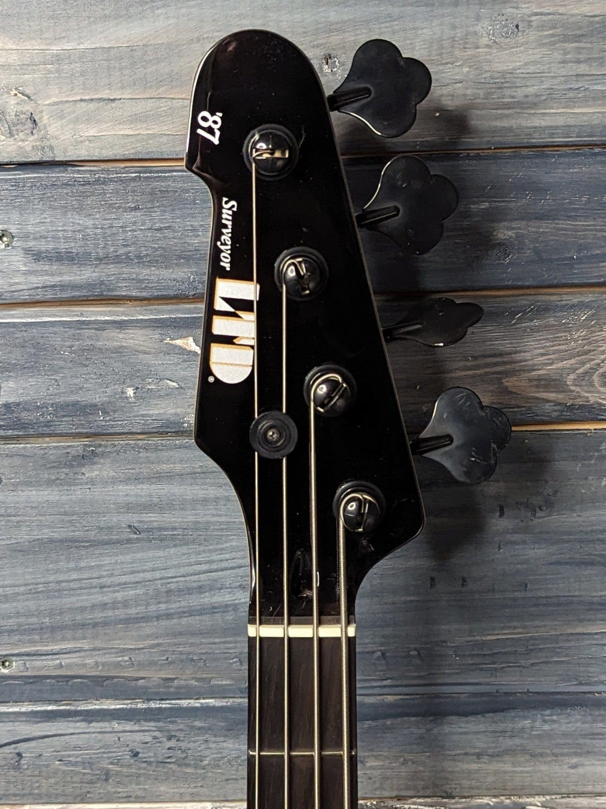 ESP/LTD Left Handed SURVEYOR '87 front of the headstock