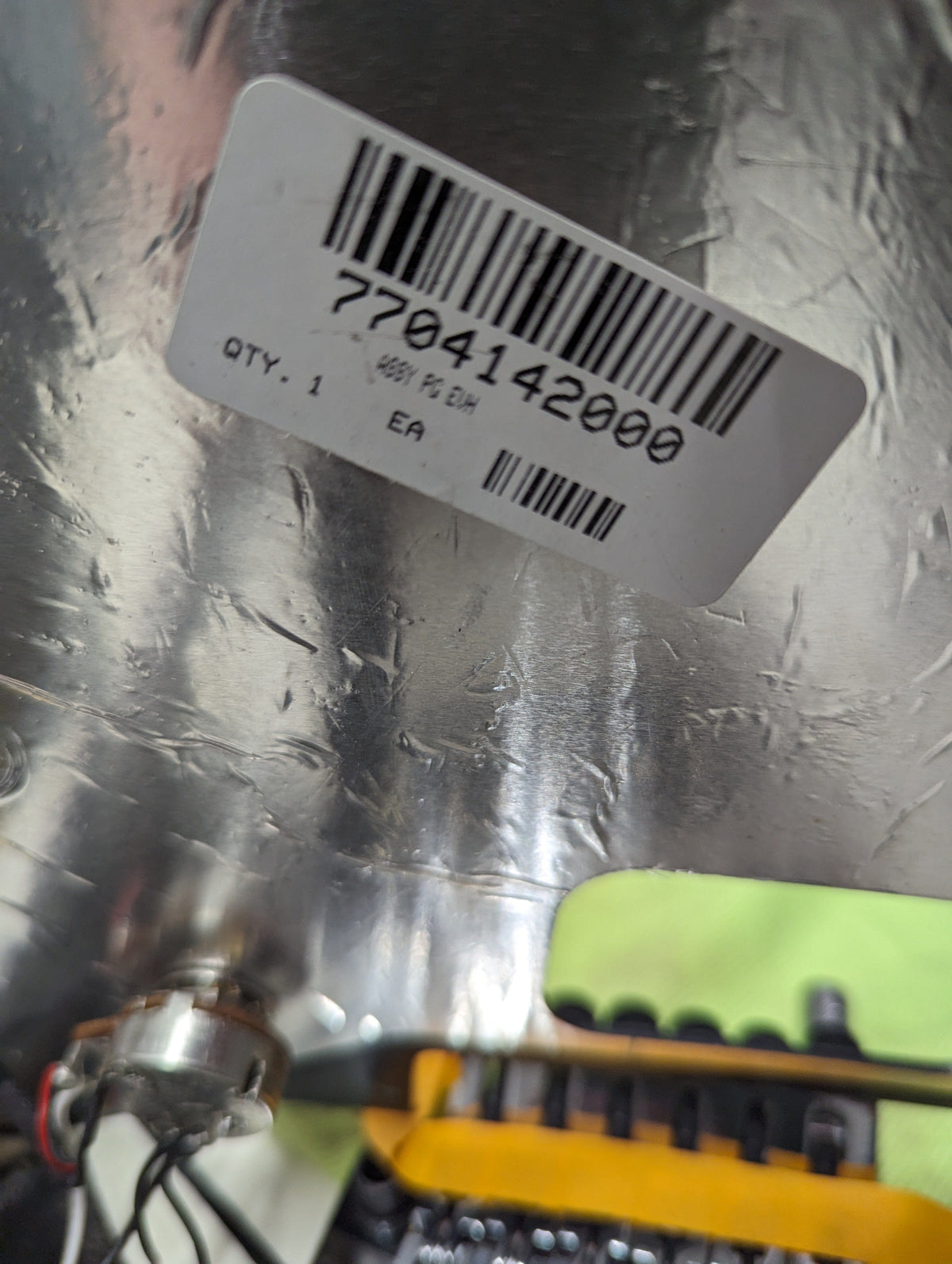 Used Fender 2021 EVH close up of label on the back of the pickguard