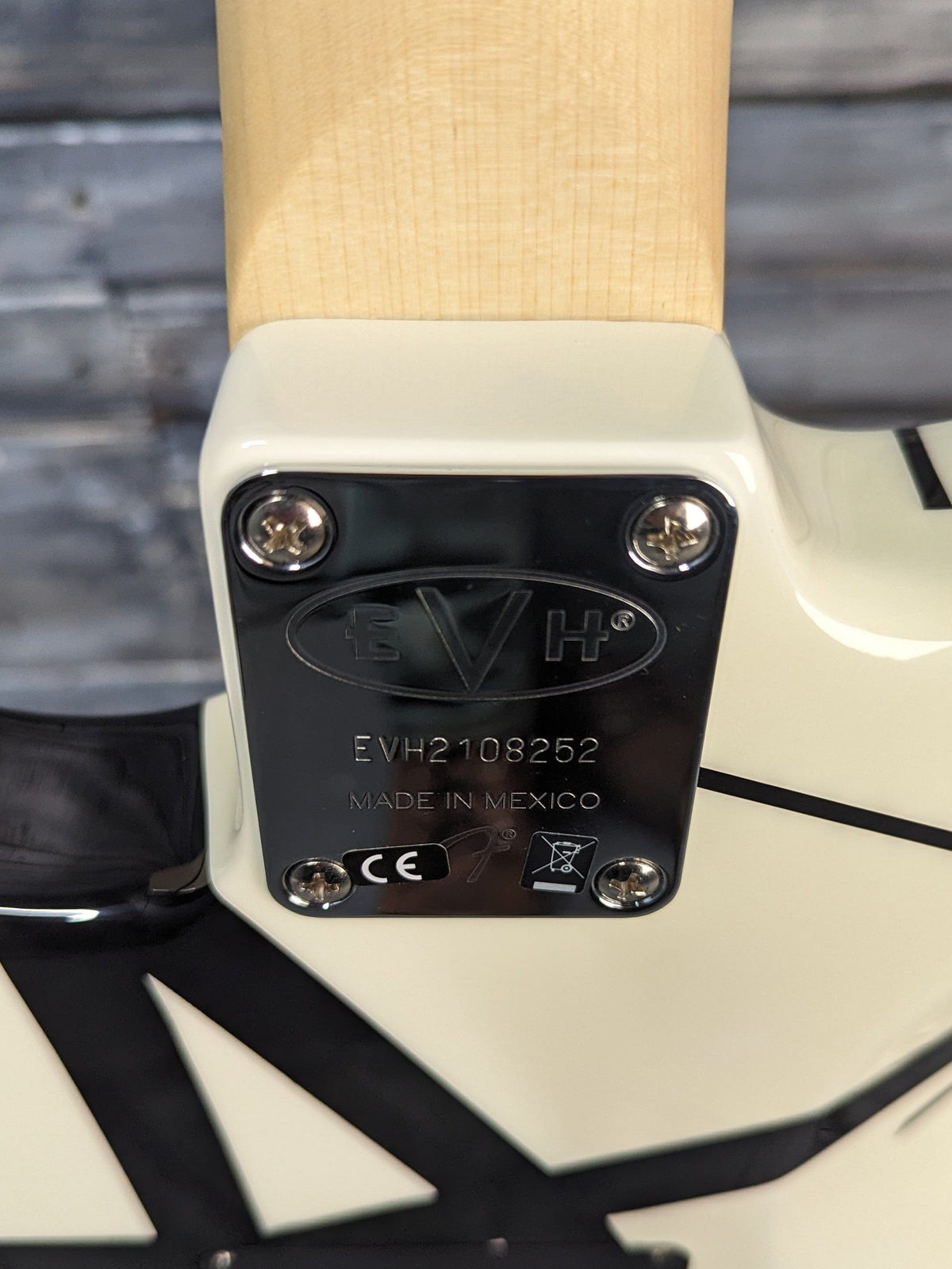 Used Fender 2021 EVH close up of the neck plate