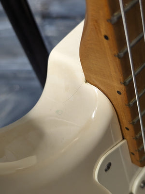Used Fender Jimmy Vaughan close up of left side finish crack
