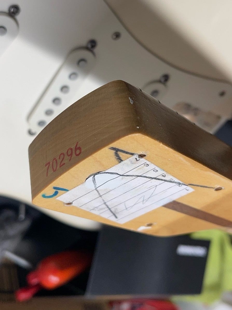 Used Fender Jimmy Vaughan part number stamped on the neck