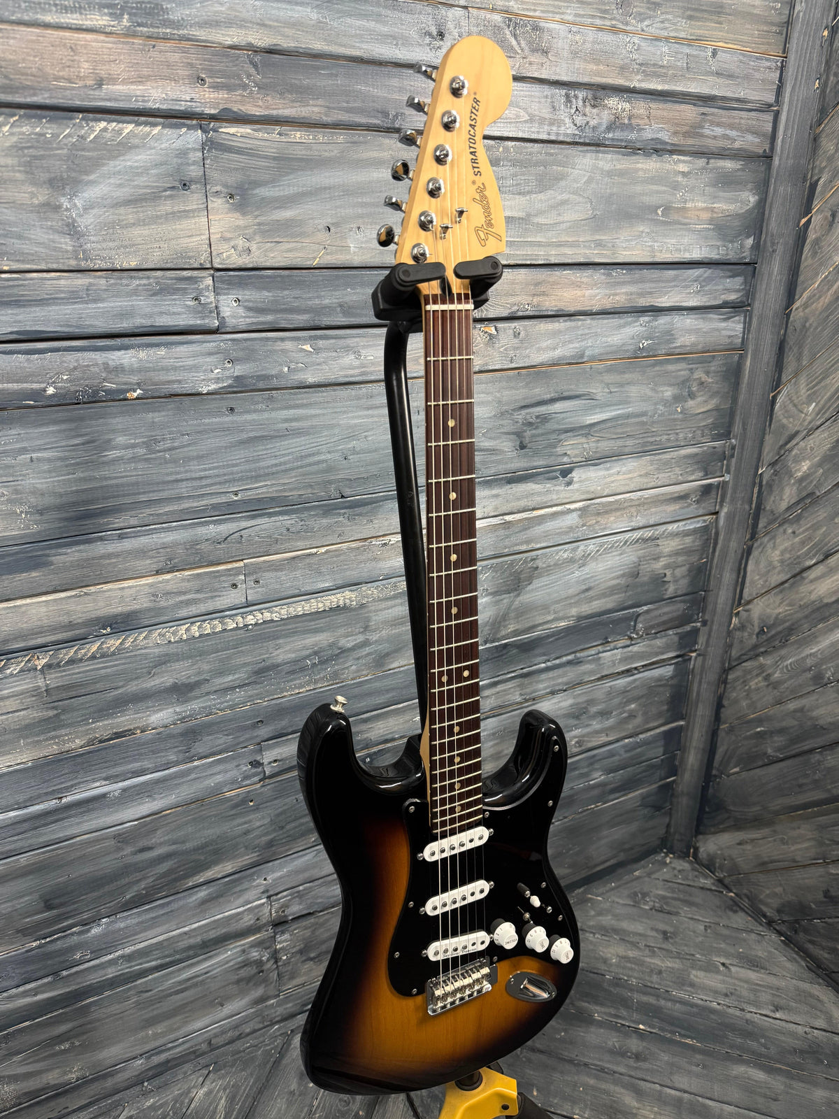Electric guitar on a wooden floor