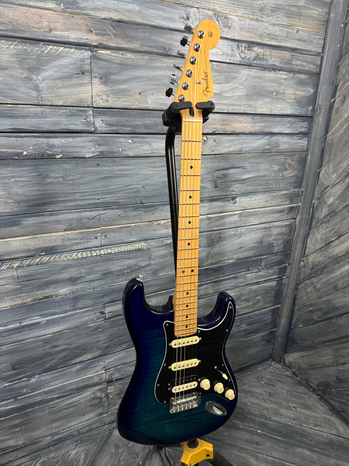 Electric guitar on a wooden floor