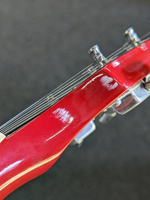 Used Gibson 1981 Marauder close up of paint transfer on the headstock