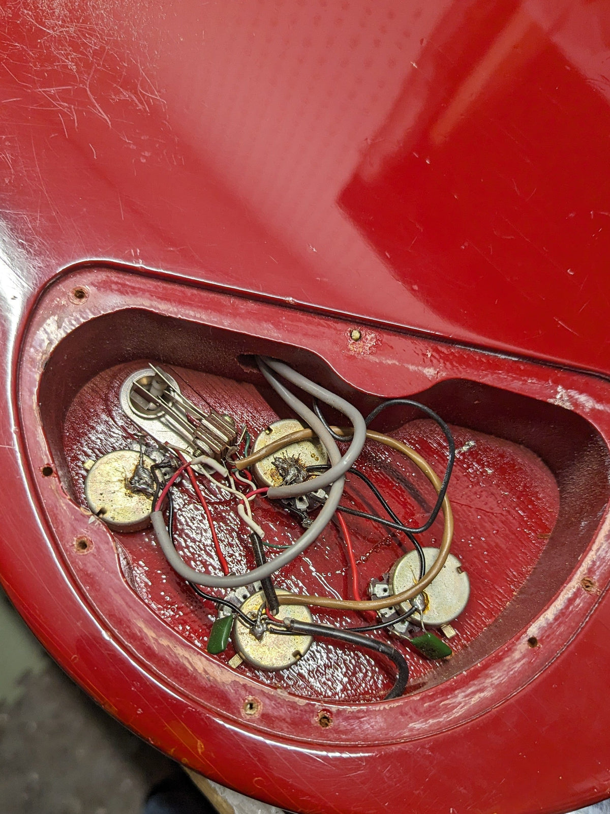 Used Gibson Invader close up of pots and wiring