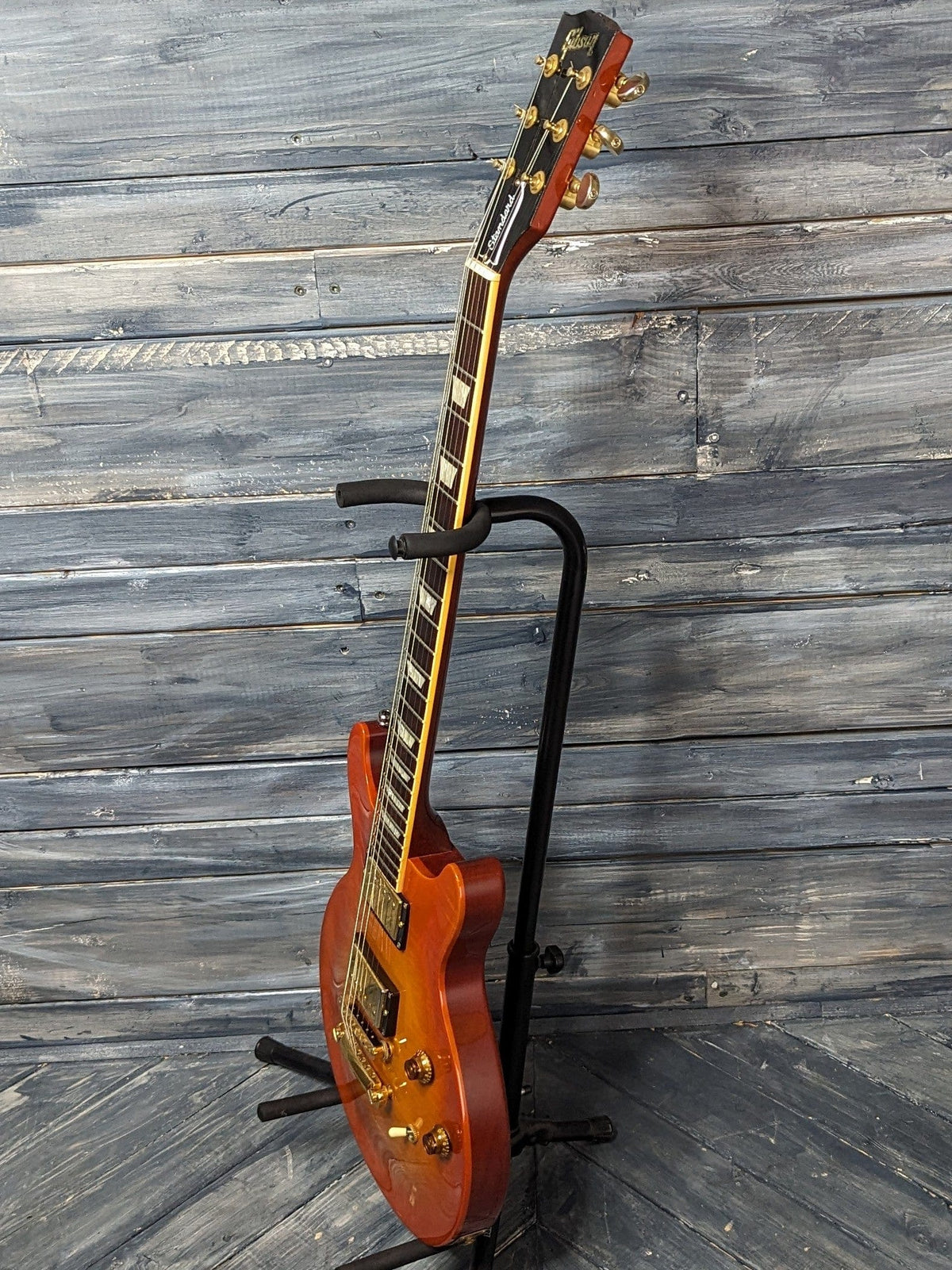 Used Gibson Double Cut Les Paul Standard full treble side view of the guitar