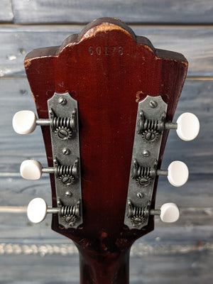 Used Guild D-25 back of the headstock