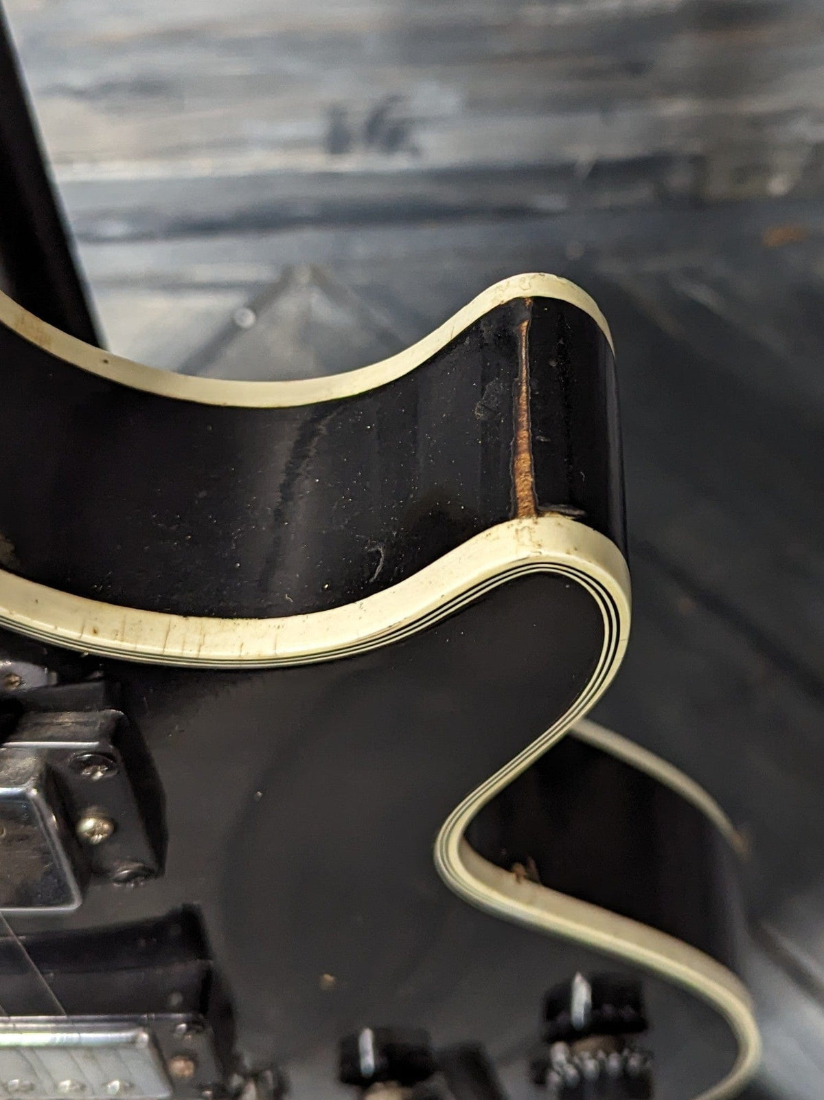 Used Hohner finish damage on the side of the guitar