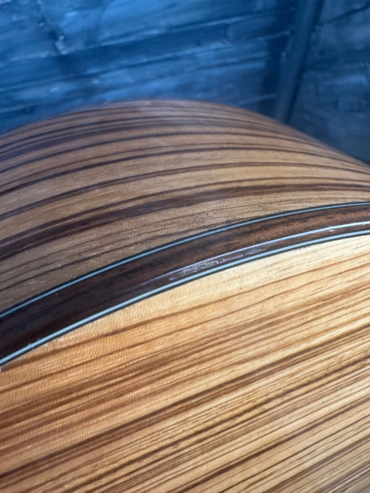 Close-up of a wooden surface with a visible grain pattern