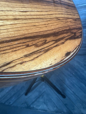 Close-up of a wooden surface with a dark background
