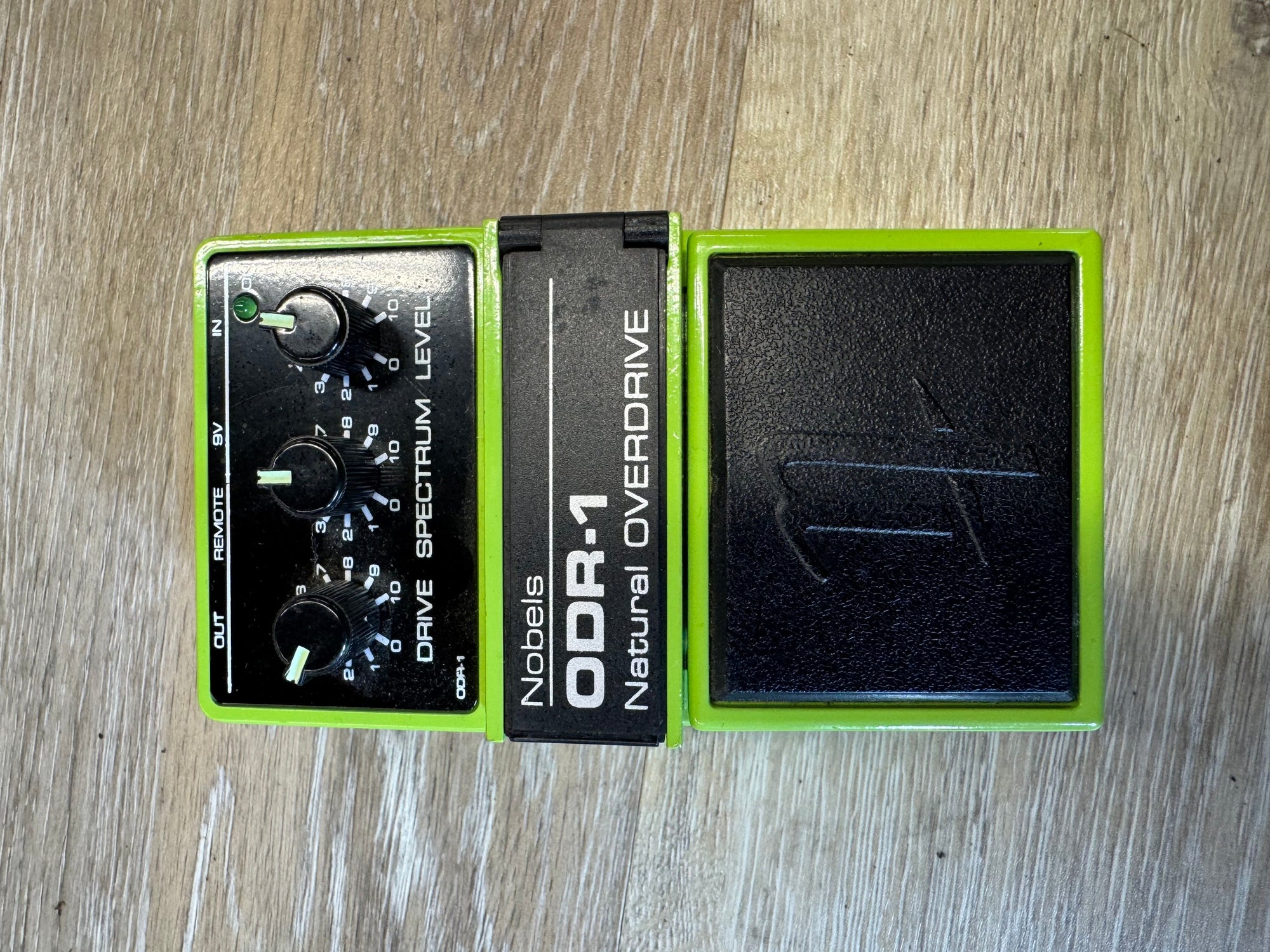 Nobels ODR-1 Overdrive pedal on a wooden surface
