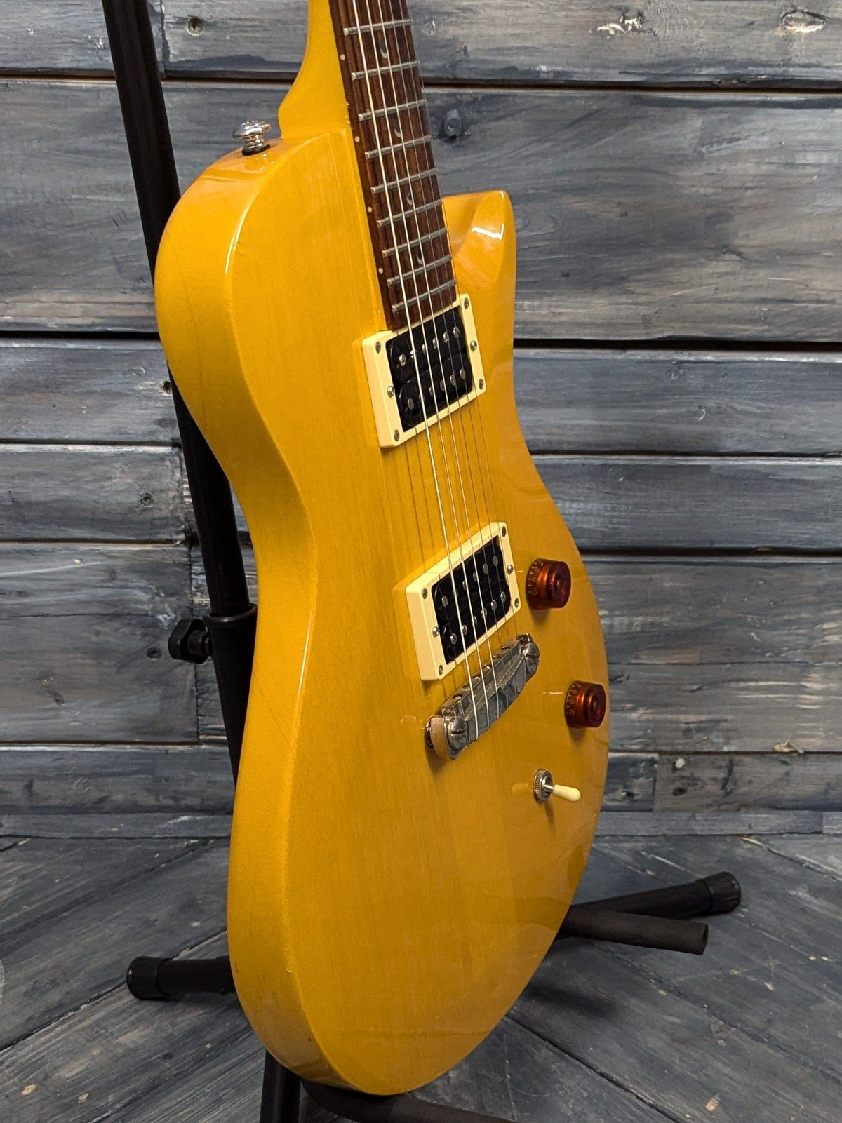 Used PRS SE Singlecut Korina bass side view of the body