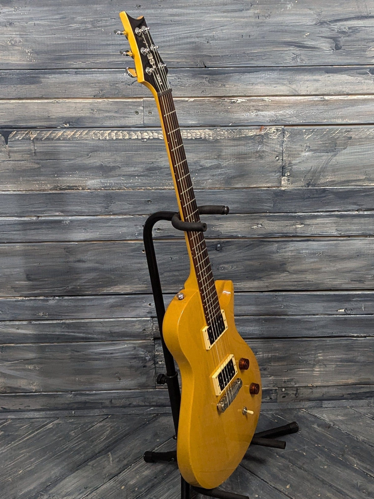 Used PRS SE Singlecut Korina full bass side view of the guitar