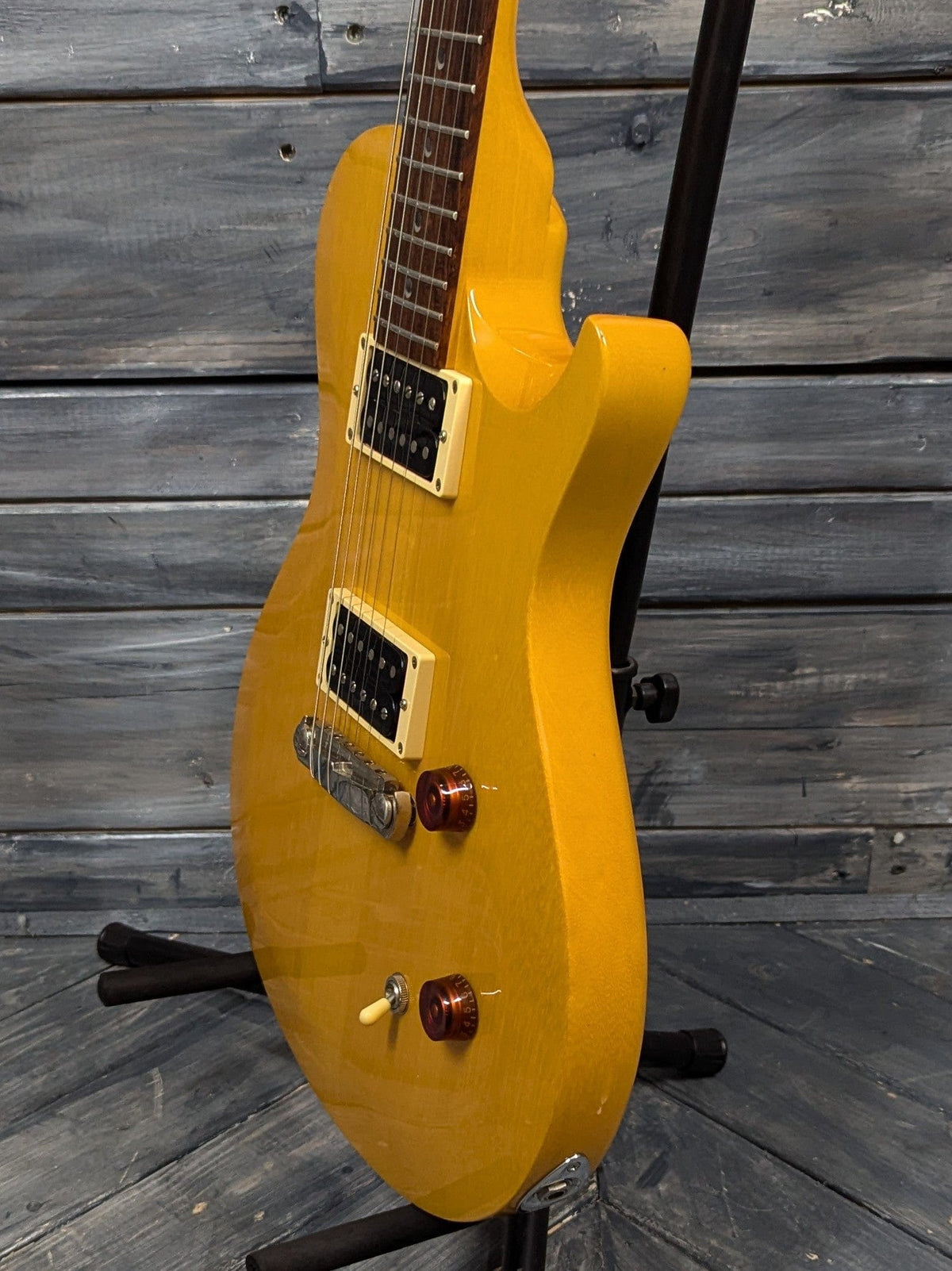 Used PRS SE Singlecut Korina treble side view of the body