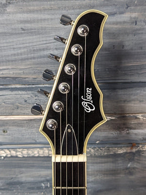 Used R.M. Olsen Guitars Ollandoc front of the headstock