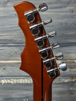 Used R.M. Olsen Guitars Ollandoc back of the headstock