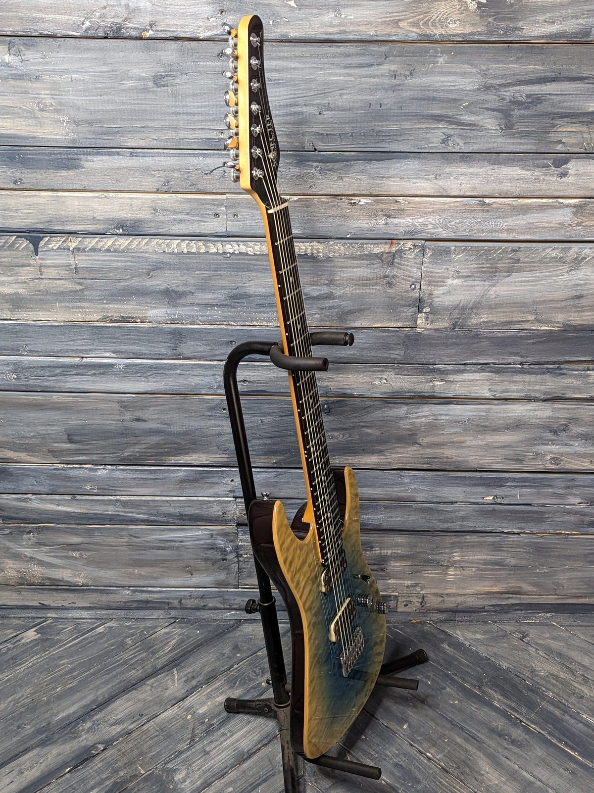 Used Schecter 7-String full bass side view of the guitar