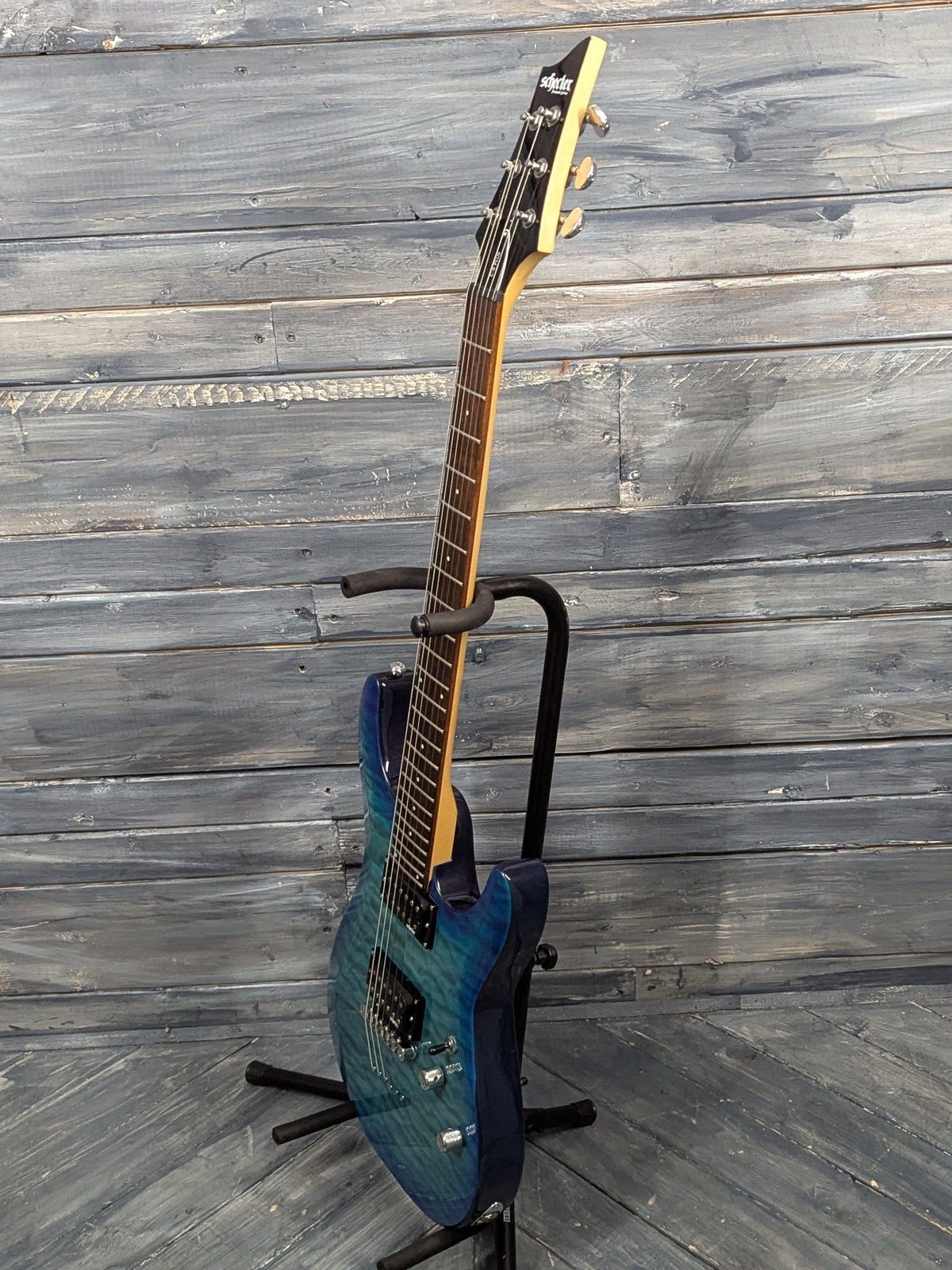 Used Schecter C-6 Plus full treble side view of the guitar