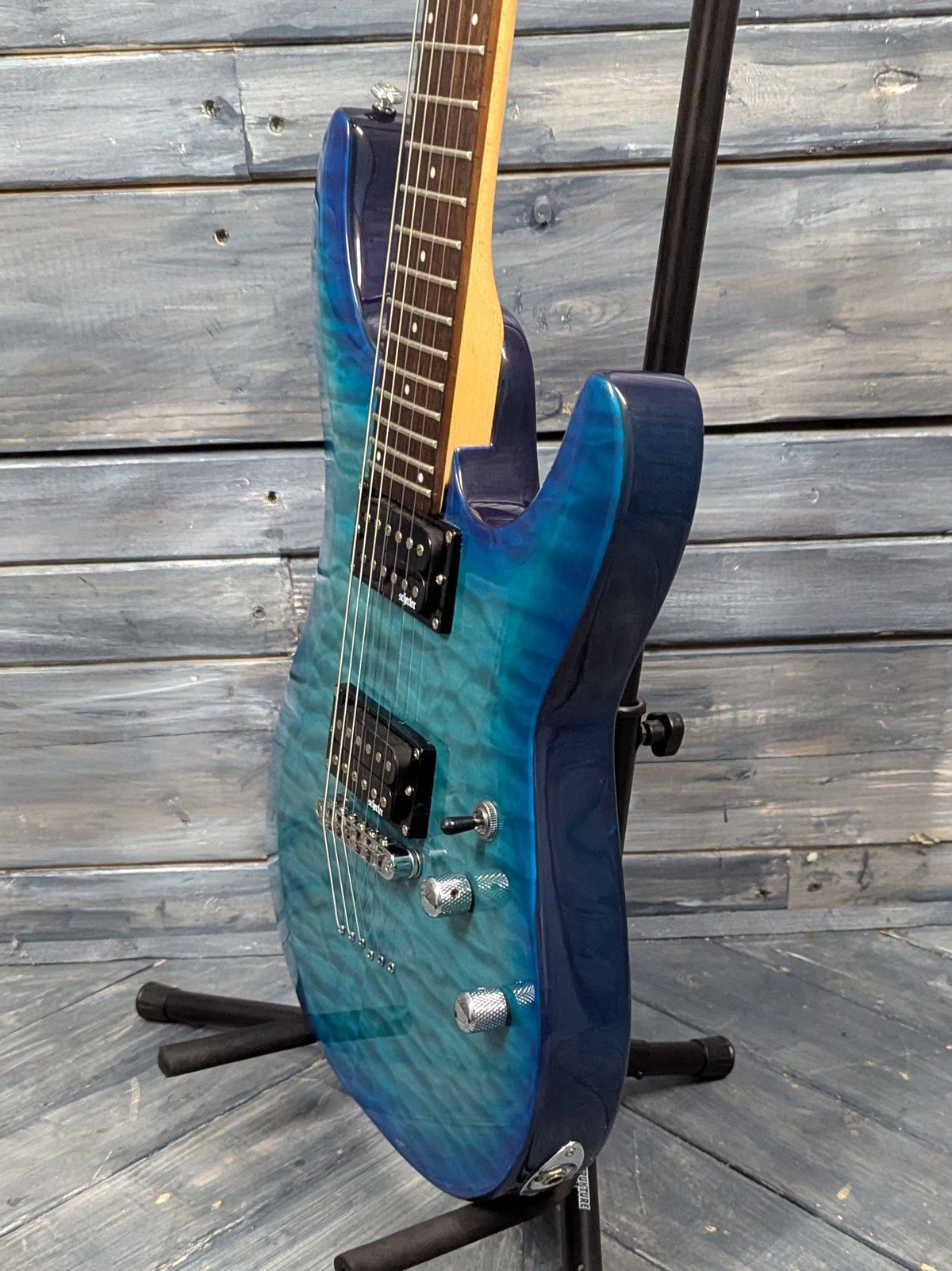 Used Schecter C-6 Plus treble side view of the body