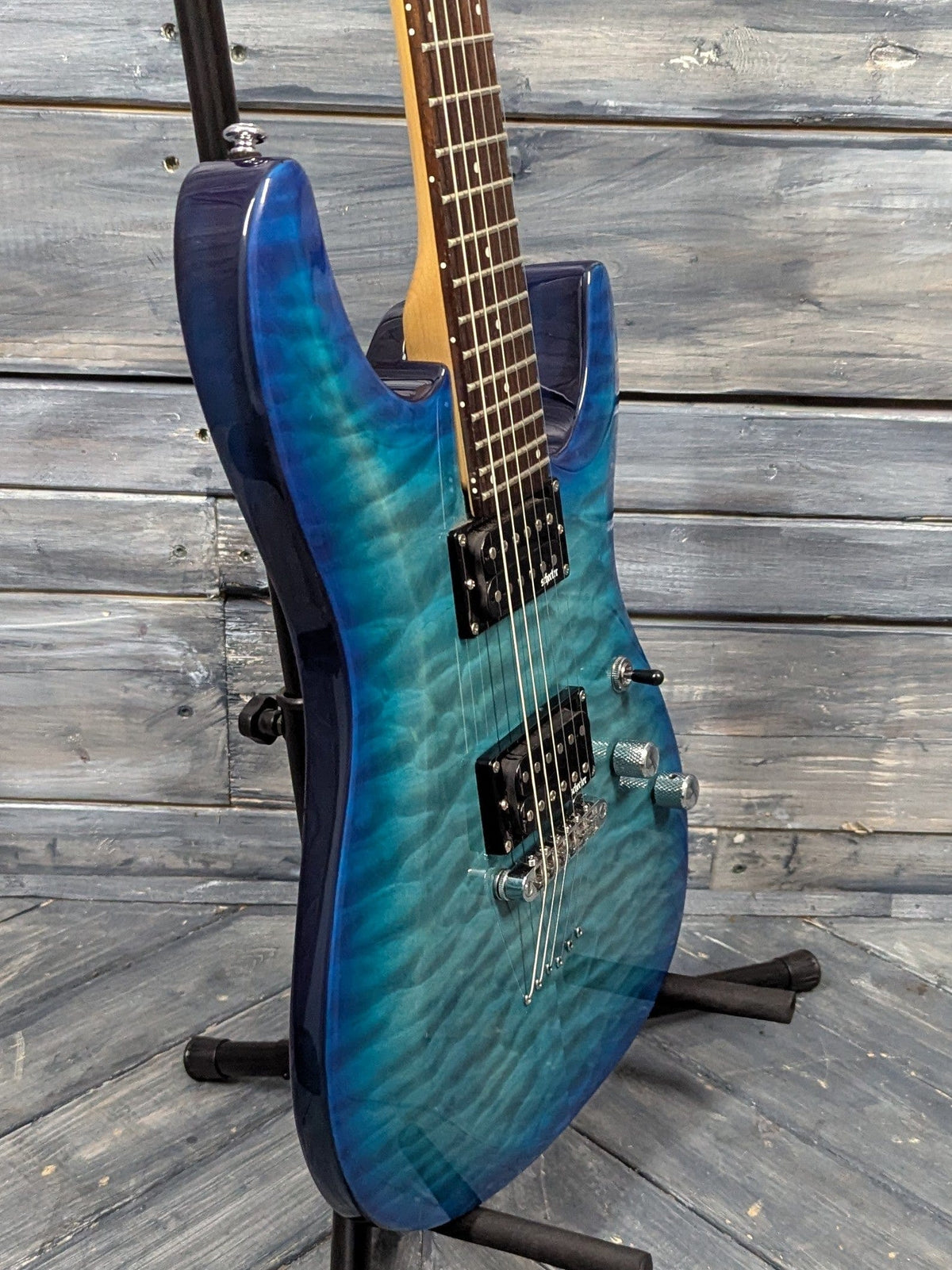 Used Schecter C-6 Plus bass side view of the guitar