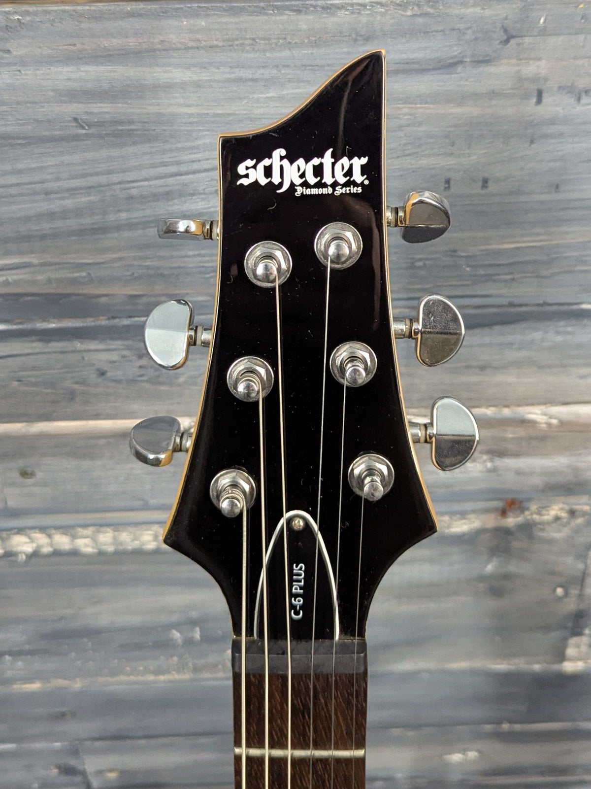 Used Schecter C-6 Plus front of the headstock