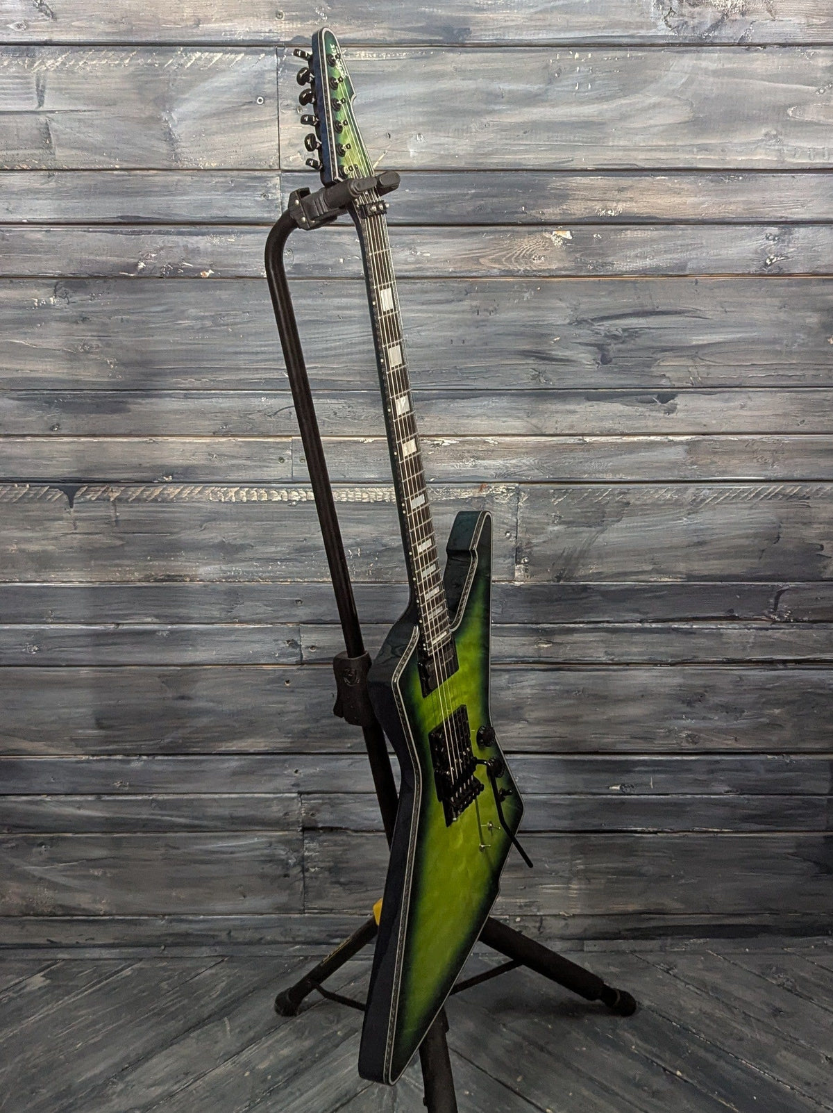 Used Schecter E-1 FR S full bass side view of the guitar