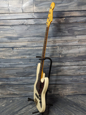 Used Squier Jazz Bass full treble side view of the guitar