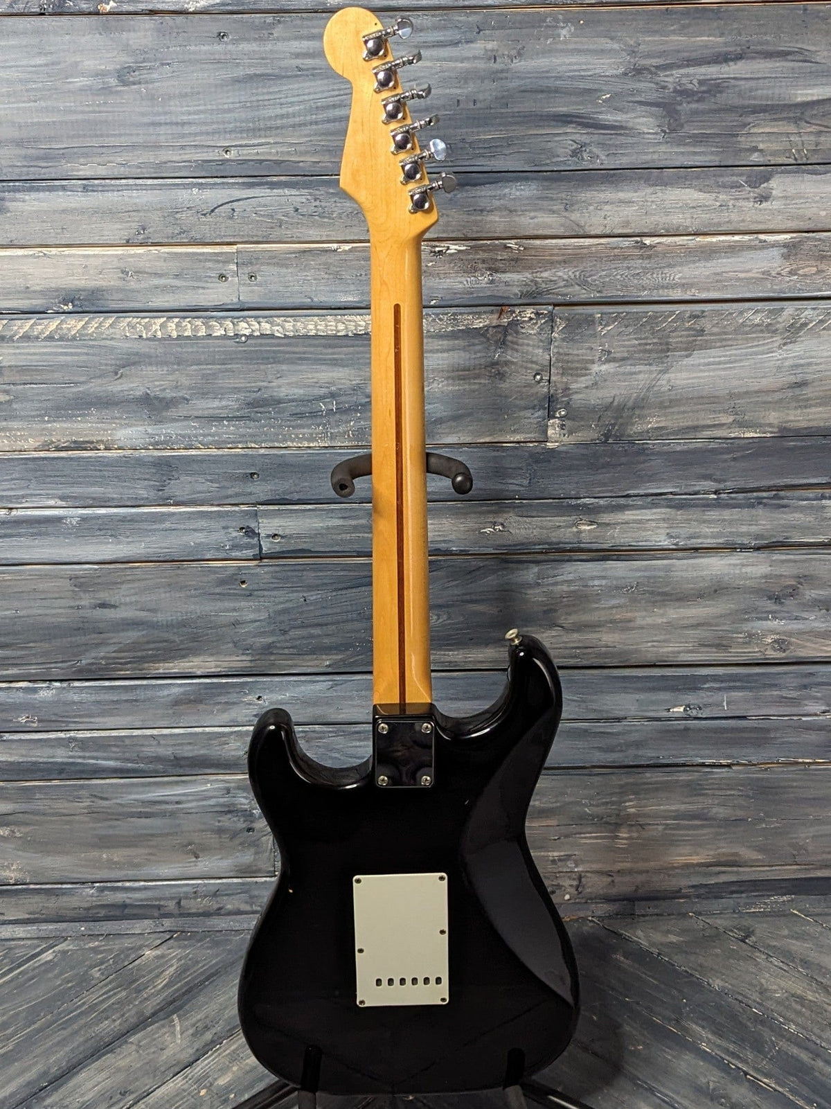 Used Squier Stratocaster full view of the back of the guitar