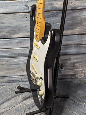 Used Squier Stratocaster treble side view of the body