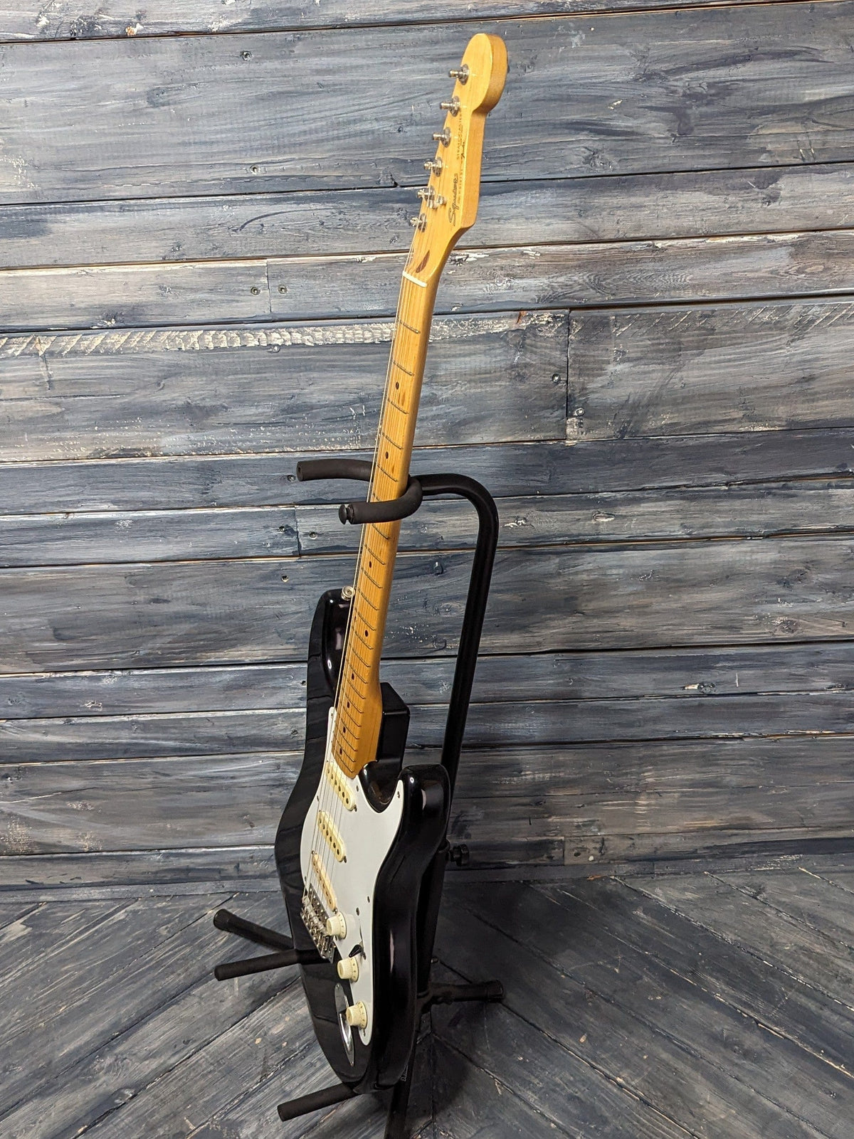 Used Squier Stratocaster full treble side view of the guitar