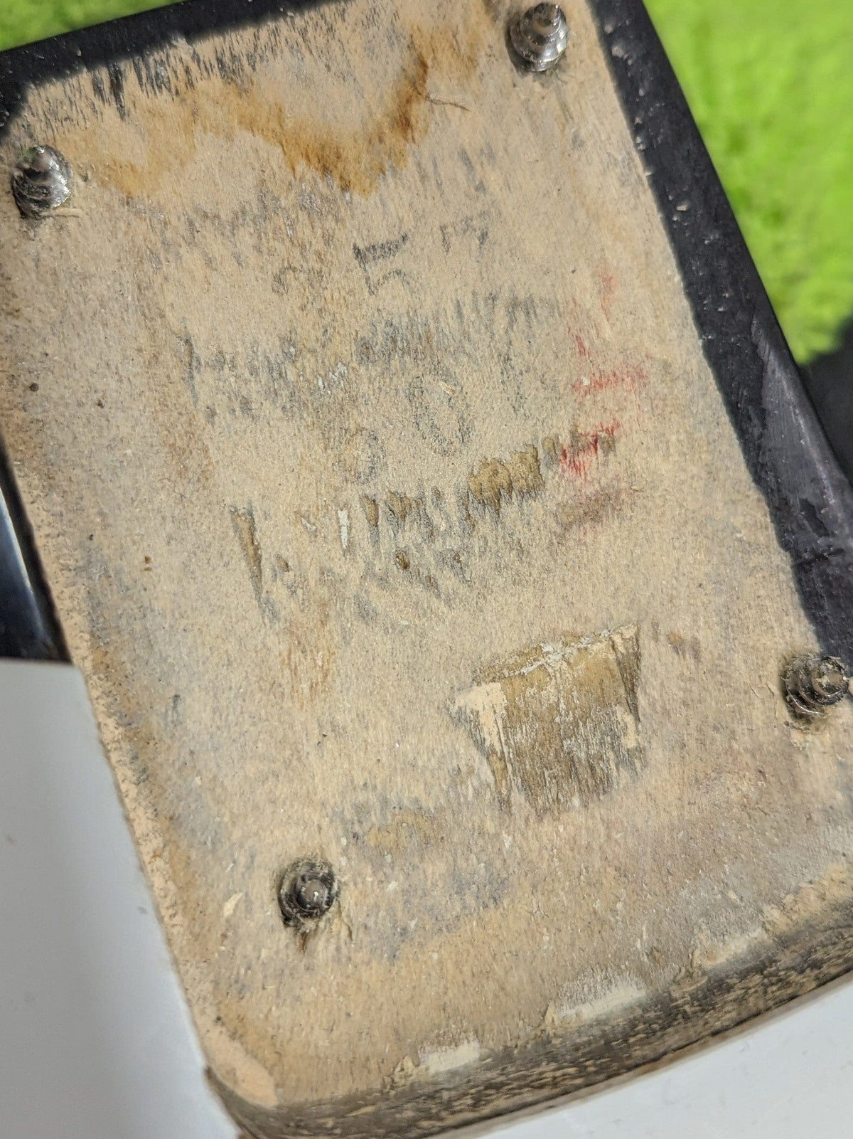 Used Squier Stratocaster close up of the neck pocket