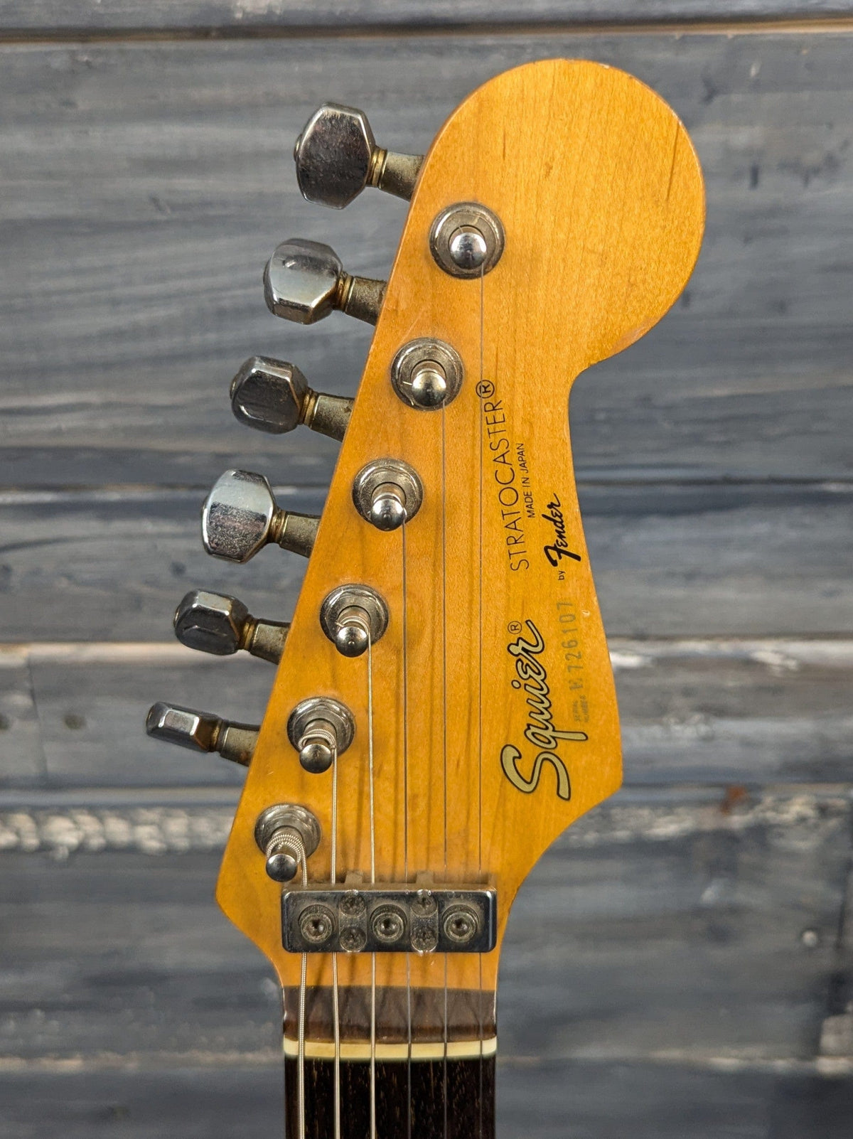 Used Squier front of the headstock