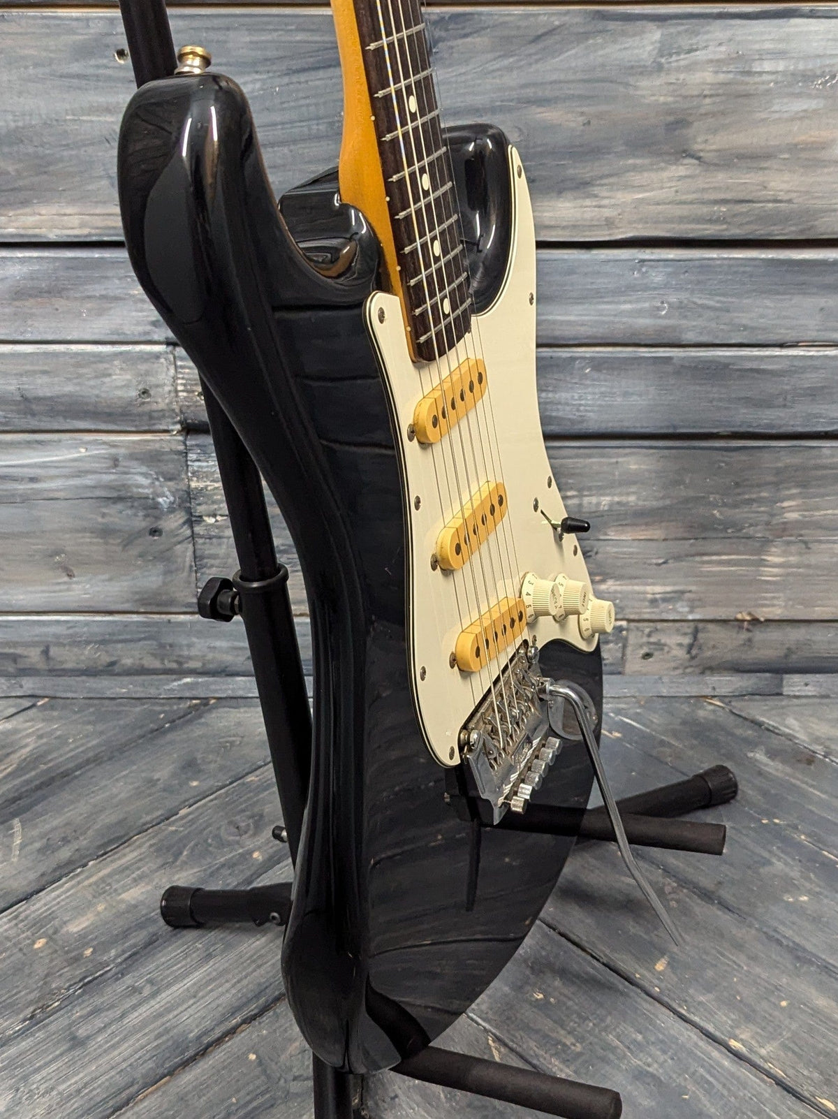 Used Squier bass side view of the body