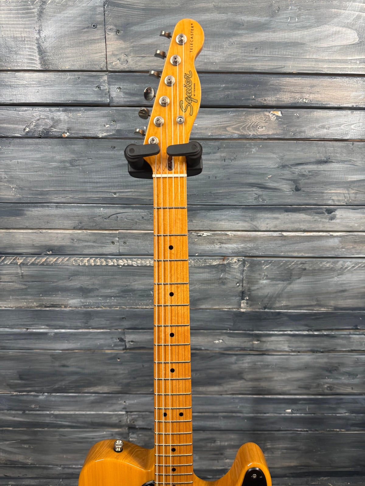 Electric guitar on a wooden surface