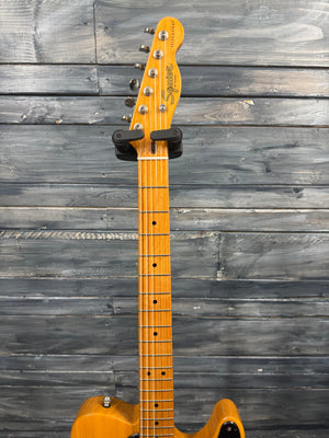 Electric guitar on a wooden surface
