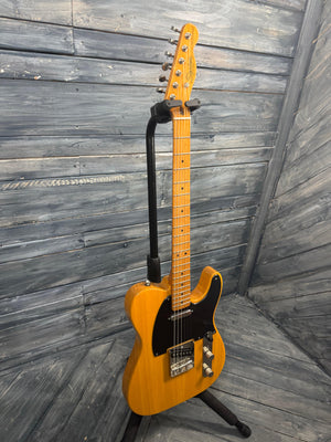 Electric guitar on a wooden floor