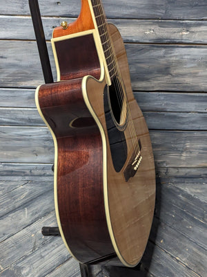 Takamine Left Handed GN51CE treble side view of the body