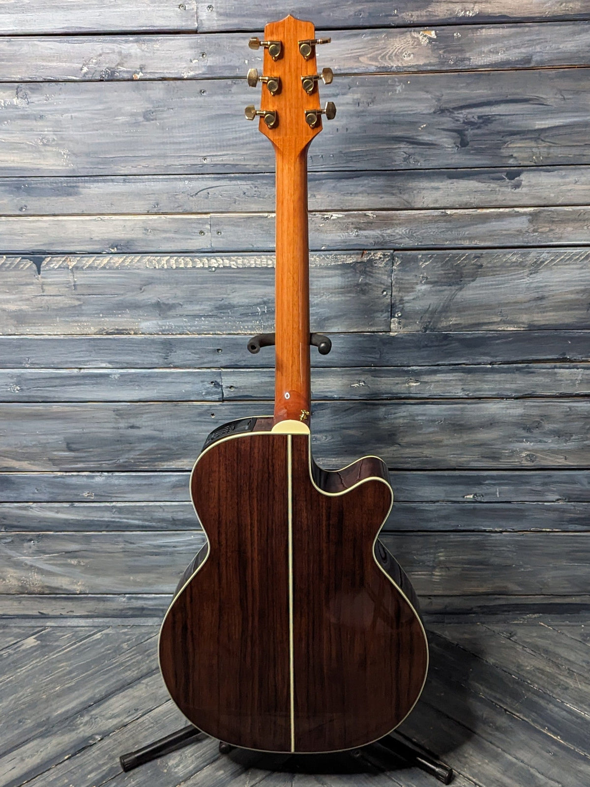 Takamine Left Handed GN51CE full view of the back of the guitar